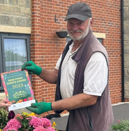 Colin winning a local gardening award