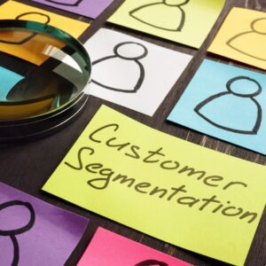 customer segmentation with sticky noteits and a magnifying glass
