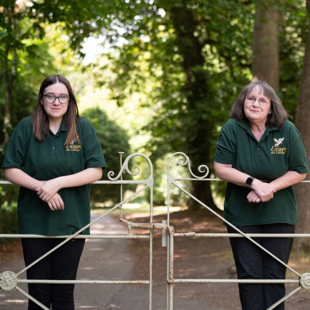 Izzy and Liz on a gate during a brand shoot