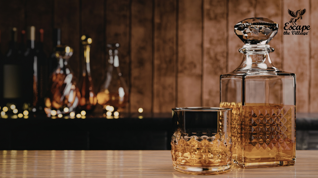 Cut crystal whiskey decanter and glass with a measure of whiskey in it